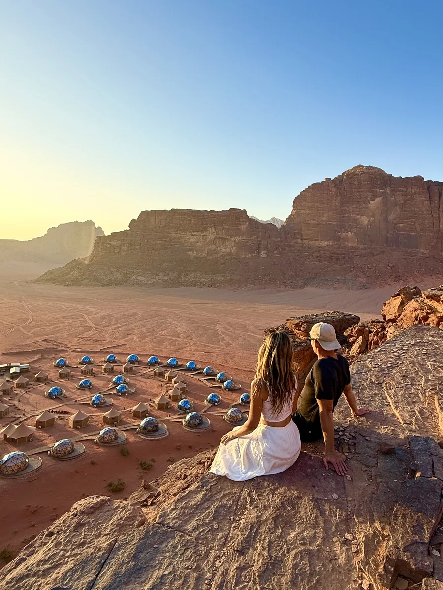 Overlooking a desert camp in Wadi Rum at sunset